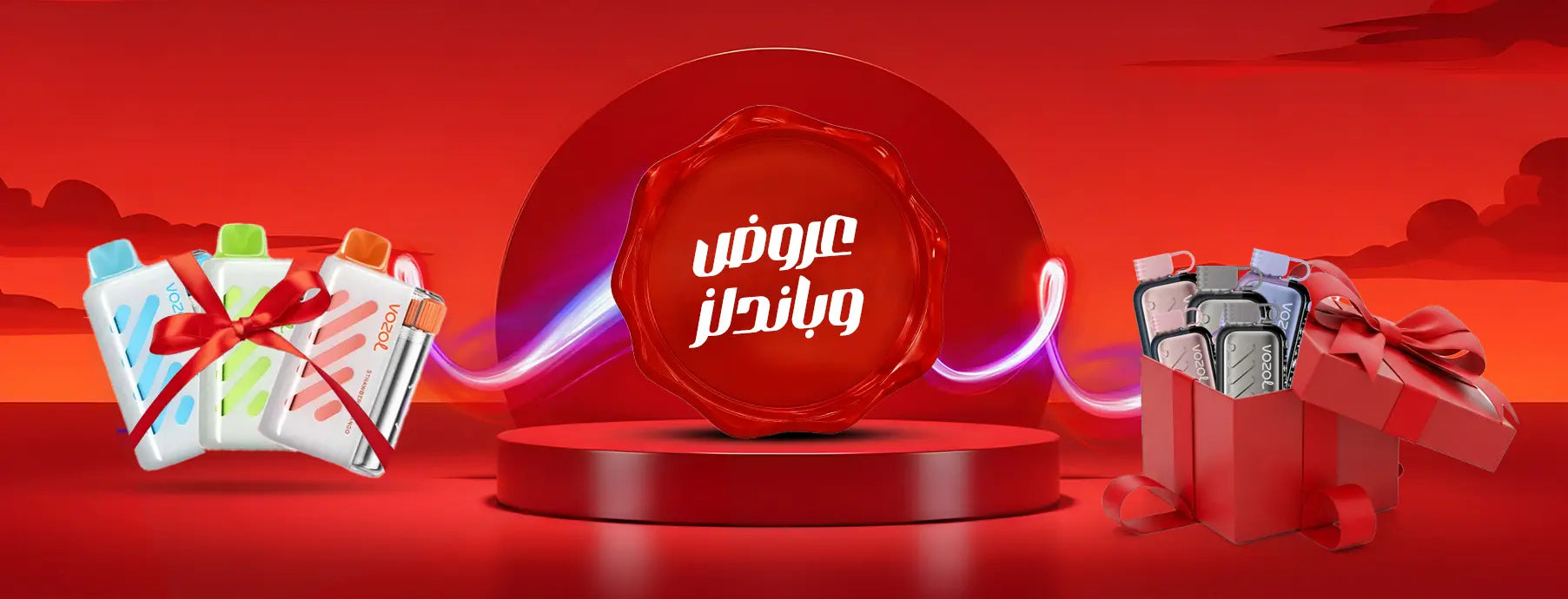 Red promotional display with a large circular sign and gift boxes on a red background
