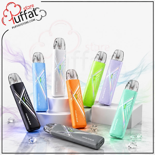 Six disposable vape devices in assorted colors (black, blue, white, orange, green, purple, and mint) are displayed on white pedestals and a marble surface with decorative crystal props. The Puffat logo is visible in the top left corner.