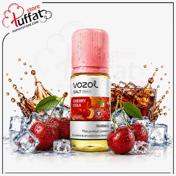 A bottle of Vozol Salt Cherry Cola e-liquid centered on a white background, surrounded by fresh cherries, ice cubes, and a splash of cola. The bottle has a pink cap and a white label with red graphics.
