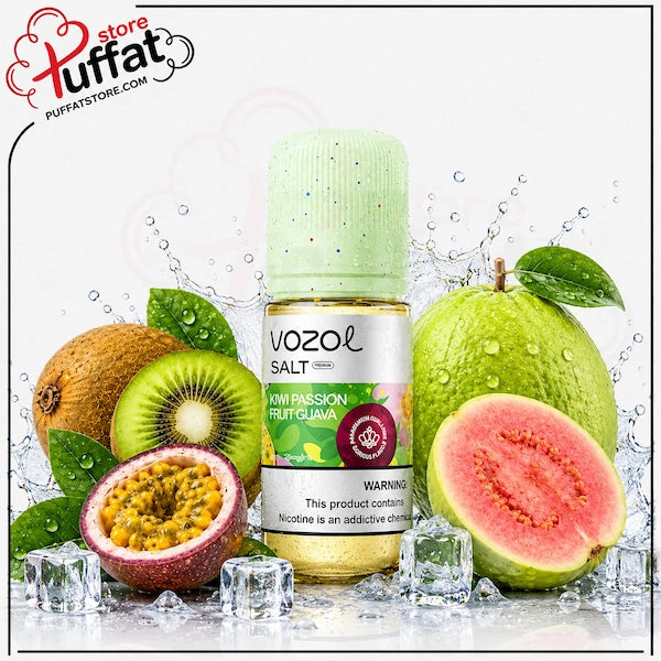 Vozol Salt e-liquid bottle labeled 'Kum Passion Fruit Guava' centered among fresh fruit and ice cubes on a white background with water splashes. The bottle has a pale green cap and a mostly white label with green and red accents.