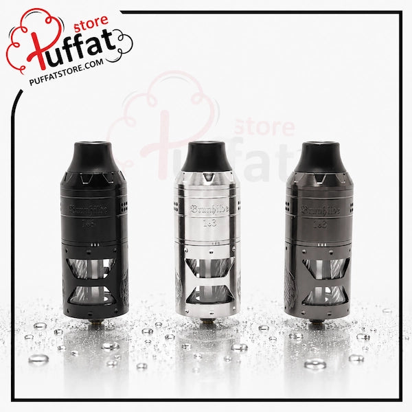 Three vaping devices on a reflective surface with 'Puffat' branding in the corner.